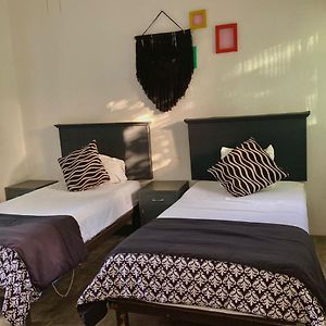 Habitación con 2 Camas Individuales